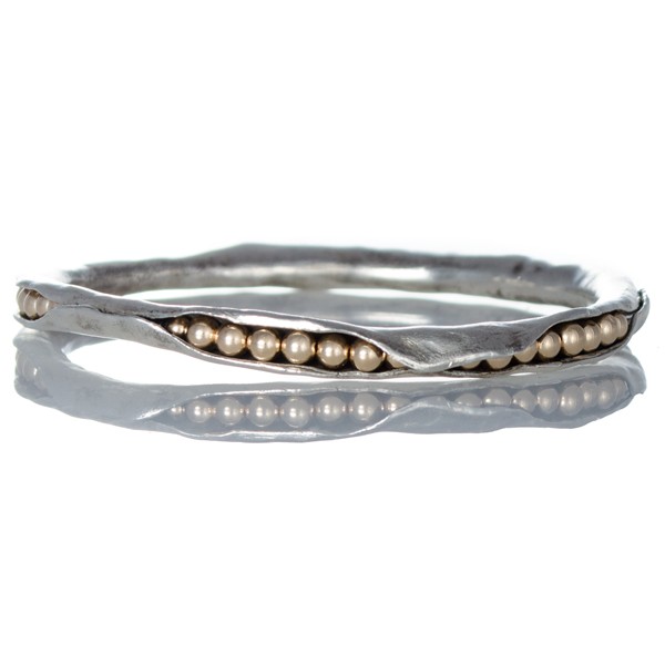 Silver pod bangle with gold beads